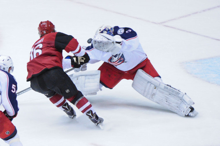 McElhinney Smashes Head on the Ice